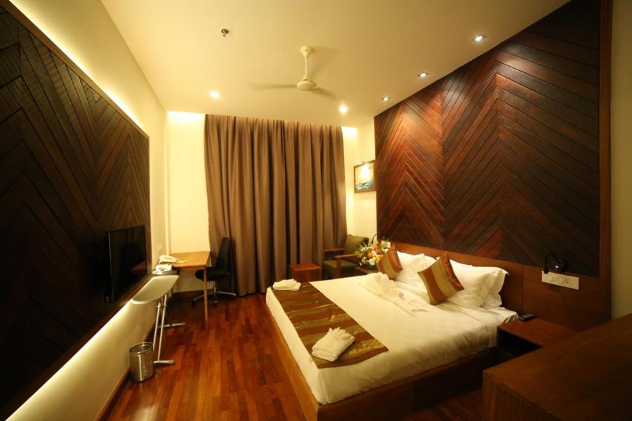 Woodies Bleisure Hotel Kozhikode Exterior foto