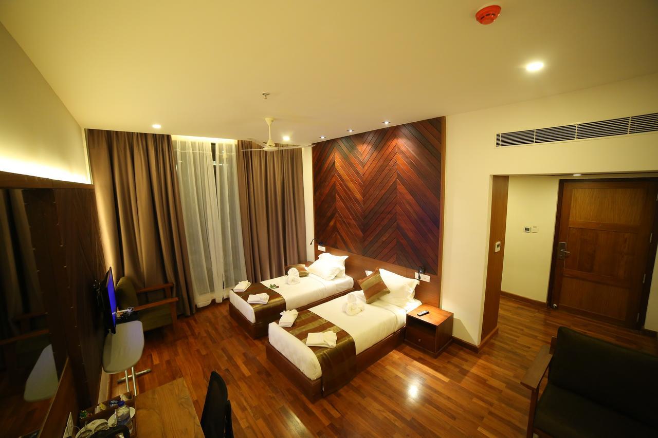 Woodies Bleisure Hotel Kozhikode Exterior foto