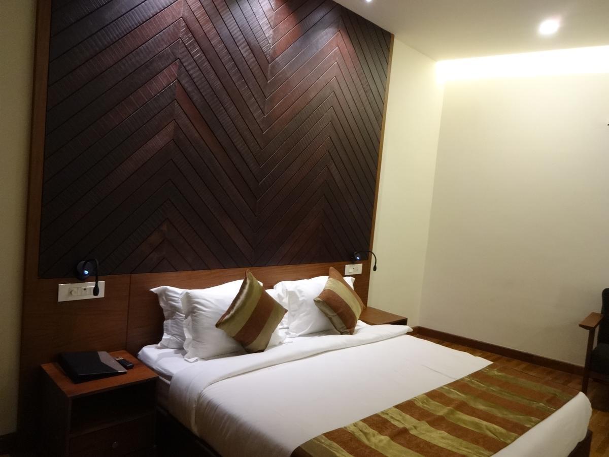 Woodies Bleisure Hotel Kozhikode Exterior foto