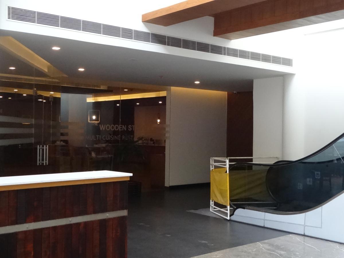 Woodies Bleisure Hotel Kozhikode Exterior foto
